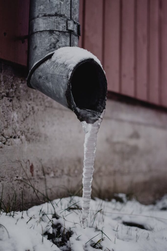 pexels-photo-6374566 Frozen Water on Drain Spout