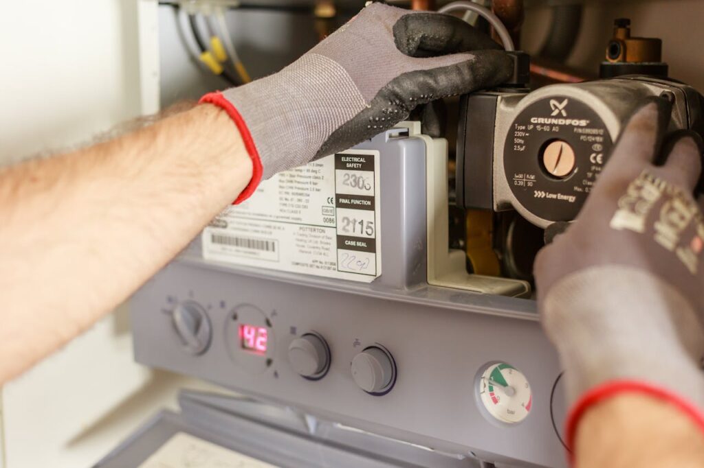 pexels-photo-7859953 Plumber Repairing Power Source
